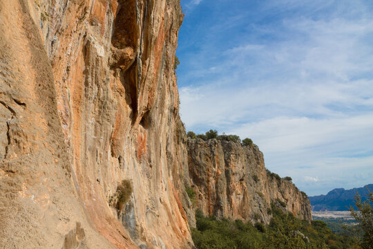 Rock climbing crag area in Geyikbayiri, Turkey. Rock climbing spot near Antalya. Geyikbayiri rockclimbing area crag in Turkey. Tuffa rock walls and caves spectacular view landscape Spectacular Cave