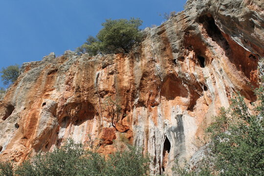 Rock climbing crag area in Geyikbayiri, Turkey. Rock climbing spot near Antalya. Geyikbayiri rockclimbing area crag in Turkey. Tuffa rock walls and caves spectacular view landscape Spectacular Cave