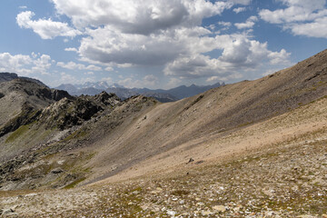 Fototapeta premium Panoramic alpine view from Col des Marches overlooking the Maurienne Valley near Valmeinier in the French Alps.