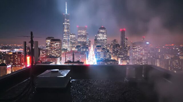 City skyline at night illuminated buildings and rooftop view