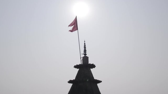 Temple flag with the sun, Ram Chaura Mandir, Hajipur, Vaishali, Bihar, India