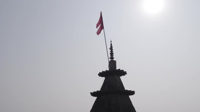 Temple flag with the sun, Ram Chaura Mandir, Hajipur, Vaishali, Bihar, India