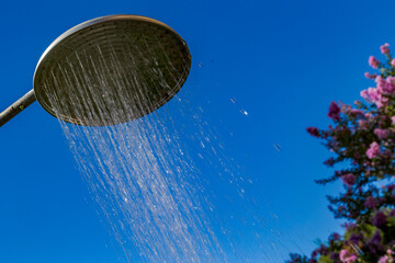 Shower in a leisure area of ​​a residence in Guarani, Minas Gerais state, Brazil. © Ronaldo Almeida