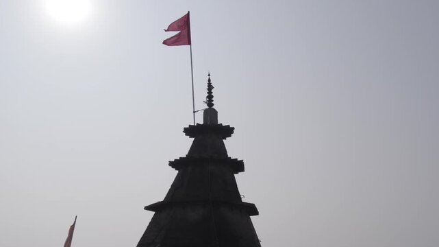Temple flag with the sun, Ram Chaura Mandir, Hajipur, Vaishali, Bihar, India