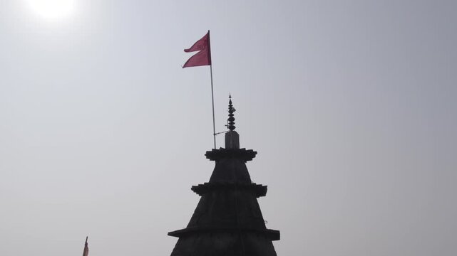 Temple flag with the sun, Ram Chaura Mandir, Hajipur, Vaishali, Bihar, India