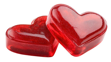 Two red heart shaped jelly candies covered with glitter studio shot isolated