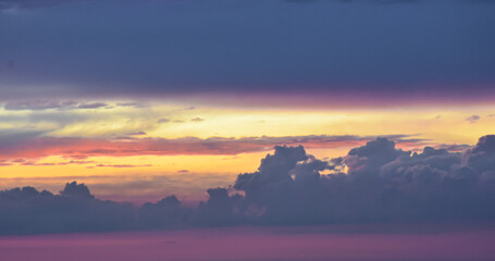 Golden hour spectacle with warm orange and purple sky textures