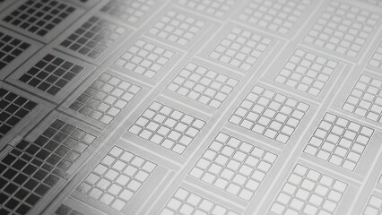 Microchip wafer with intricate circuit patterns and grid design