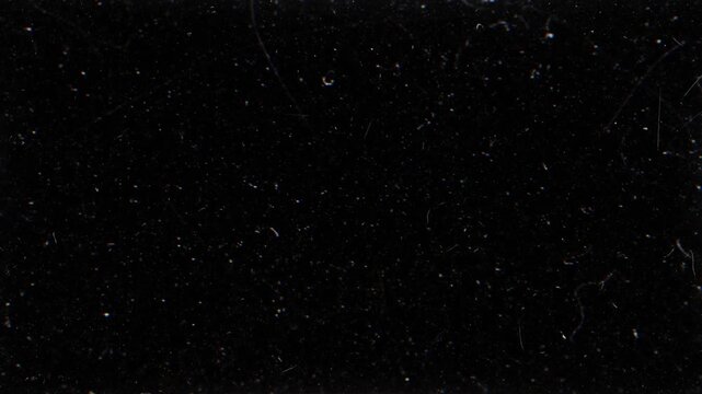 Flickering film scan overlay with scratches and grain texture