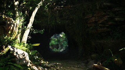 Fototapeta premium A mysterious cave entrance opens up to vibrant greenery and sunlight filtering through. The scene invites exploration, showcasing natures hidden wonders and tranquility.