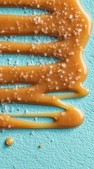 caramel streaks and salt dust on blue-toned mountain expanse