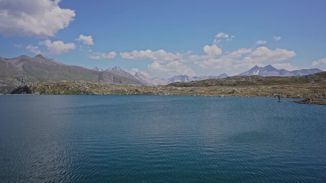 Totensee Lake Shoreline at Grimsel Pass, Clear Blue Water and Mountain Panorama.Filmed on 30 July 2025.
