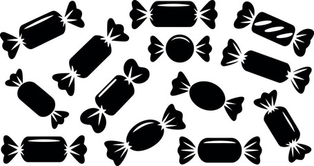 A collection of black and white candy wrappers in various shapes and sizes scattered across a clean isolated background representing a sweet treat concept