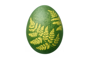 Green easter egg displaying yellow fern pattern