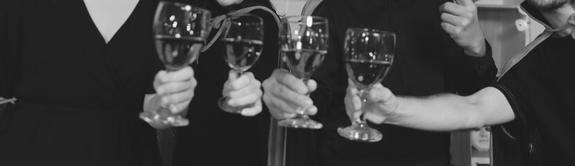 Friends enjoying a Halloween party at a bar making a toast