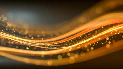 Elegant golden flowing wave lines with sparkling bokeh lights creating a dynamic abstract background full of warmth and motion in soft focus effect