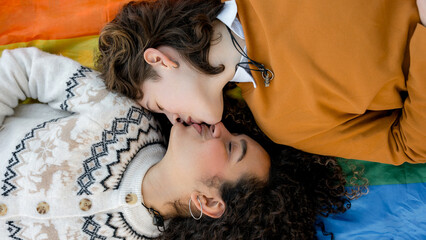 Couple of young women embracing pride and love