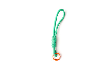 Green paracord keychain lanyard with orange carabiner isolated on white background. Useful for outdoor gear retail, travel security accessories, corporate branding, safety equipment, adventure
