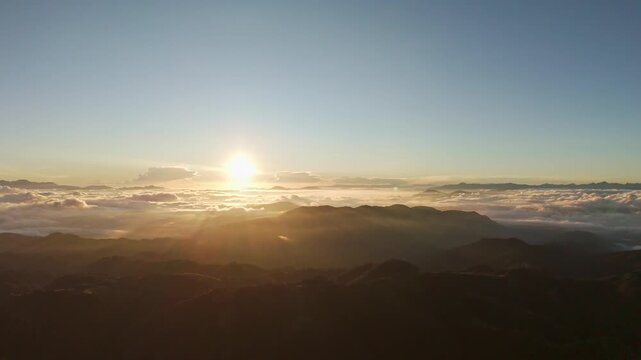 Sunrise in the Sierra Gorda of Queretaro among mountains above the clouds