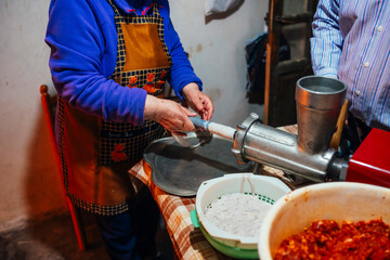 Traditional chorizo preparation in rural setting