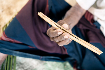 Traditional method of crafting cinnamon sticks by hand