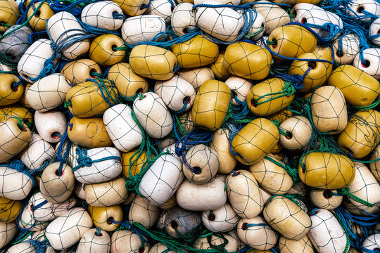 Colorful fishing float collection on Sri Lankan coast