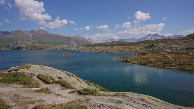 Blue Alpine Lake and Mountain Landscape at Grimsel Pass Switzerland.Filmed on 30 July 2025.