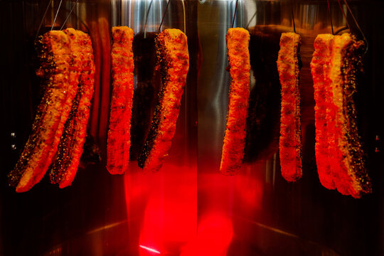 Curing pork belly in a smoking oven in Taiwan