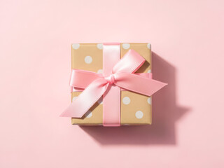 Elegant polka dot gift box with pink ribbon