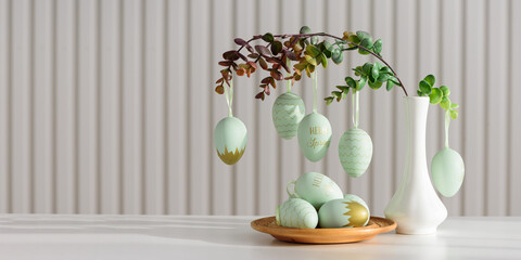 Hanging Easter Eggs and Spring Branches in Vase. Festive Pastel Decor