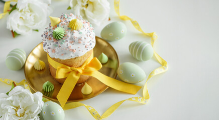 Easter Cake Decorated Yellow Ribbon with Flowers and Pastel Eggs on White Background