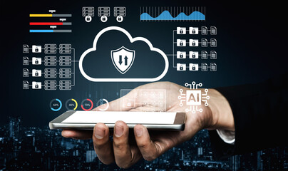 A hand holds a smartphone displaying cloud data storage graphics, security features, and AI technology, symbolizing modern digital innovation in a city at night. Gantry
