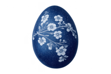 Blue easter egg with delicate floral pattern isolated