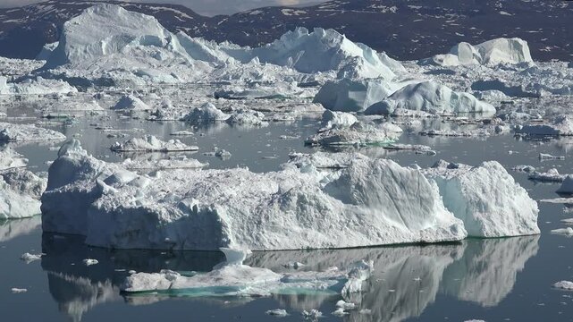 GREENLAND - 11.4.2025 - Terrific aerial timelapse of differently sized ice floes moving down Greenland's Disko Bay.