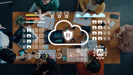 A team collaborates in a modern workspace, analyzing data and utilizing cloud computing technology with a focus on security and artificial intelligence insights. Gantry