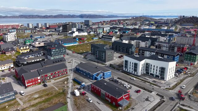 GREENLAND - 11.4.2025 - Great aerial view of buildings and traffic on the coast of Nuuk, Greenland.
