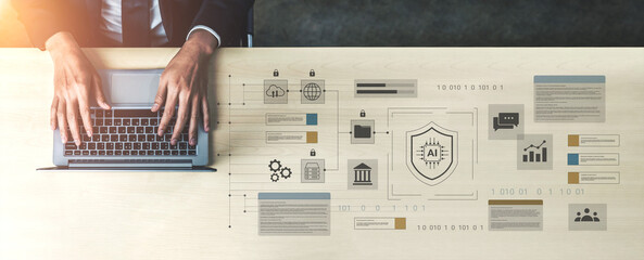 A business professional works on a laptop at a modern workspace, with graphics illustrating digital security and data protection concepts surrounding them. Gantry