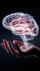 Concept of brain held in hand with light effects in dark setting