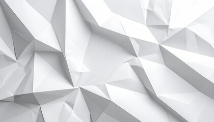 Fototapeta premium A geometric pattern with white, folded paper creating a 3D effect of peaks and valleys