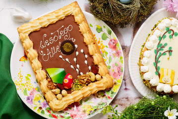 Traditional Polish Easter pastry Mazurek on an Easter background.top veiw