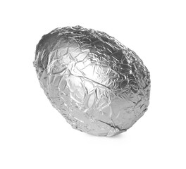Obraz premium Chocolate egg wrapped in foil isolated on white. Happy Easter