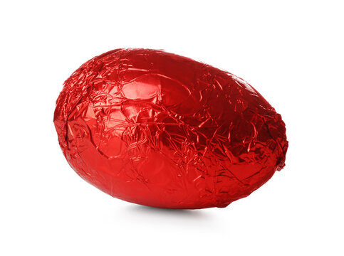 Chocolate egg wrapped in red foil isolated on white. Happy Easter
