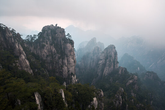Misty sunset over Rocky landscape, Huangshan mountain, China