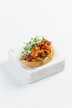 Bruschetta with Roasted Vegetables and Microgreens