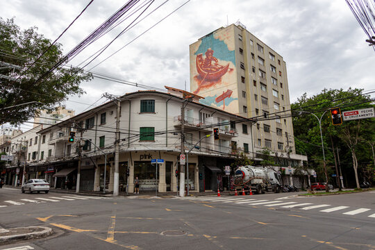 Sao Paulo, SP, Brazil - November 08 th, 2025: Corner of Avenida Pedroso de Morais and Rua Teodoro Sampaio with old buildings and the mural "Rios Aereos" by the artist Yara Amaral Gurgel.