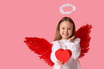 Fototapeta premium Cute little girl dressed as cupid with gift box on pink background. Valentine's Day celebration