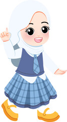 Young girl in hijab standing happily outdoors