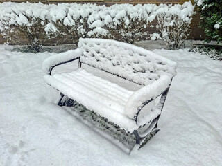 Snow Covered Bench During Winter