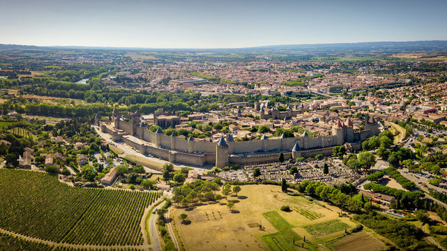 Old medieval city Carcassonne viewed from the sky on a sunny day. The old town has fortification walls from the middle age
