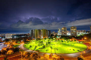 Ribeirão Preto, Brazil. Storm over the city at night, lightning and urban park during the New...